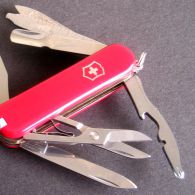 Нож складной, мультитул Victorinox Outrider (111мм, 14 функций), красный 0.9023