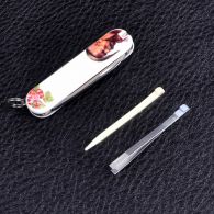 Нож складной, мультитул Victorinox Classic SD Ukraine Козак (58мм, 7 функций), белый 0.6223.7R2