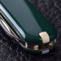 Нож складной, мультитул Victorinox Classic SD (58мм, 7 функций), зеленый 0.6223.4